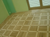 Realizacja podłogi drewnianej w klubie garnizonowym w Jednostce Wojskowej w Świętoszowie. Zdjęcie nr: 7
