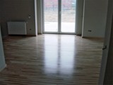 Realizacja podłogi drewnianej w mieszkaniu prywatnym. Zdjęcie nr: 3